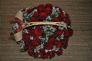 Basket of 49 red roses top view