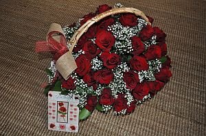 Basket of 49 red roses
